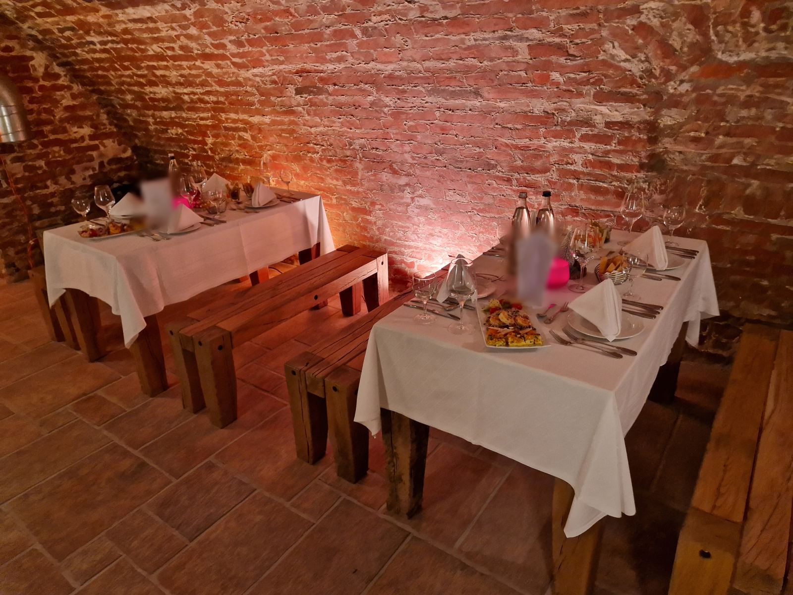 Festively laid tables in a side vault
