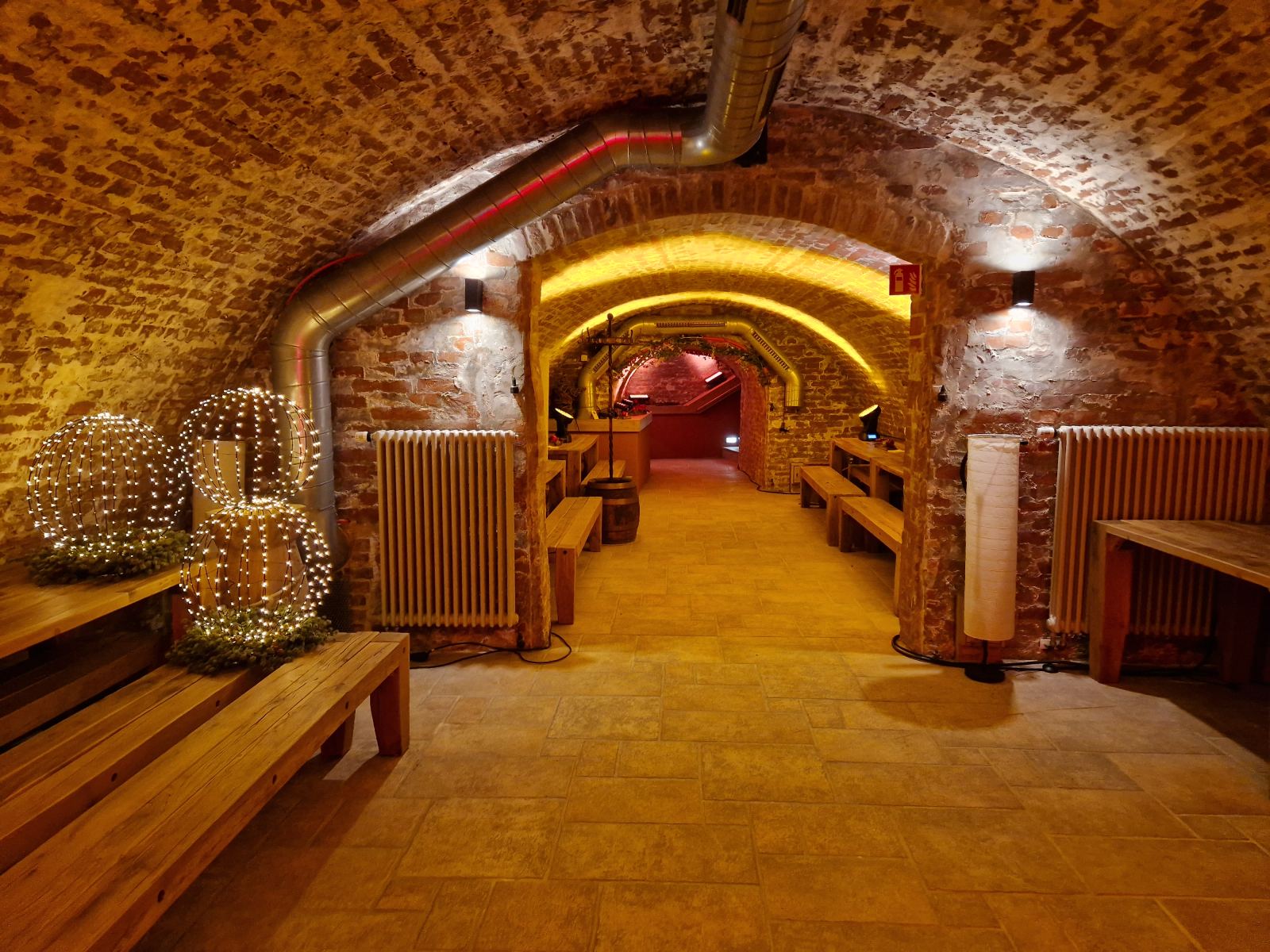 Vaulted passage with light spheres
