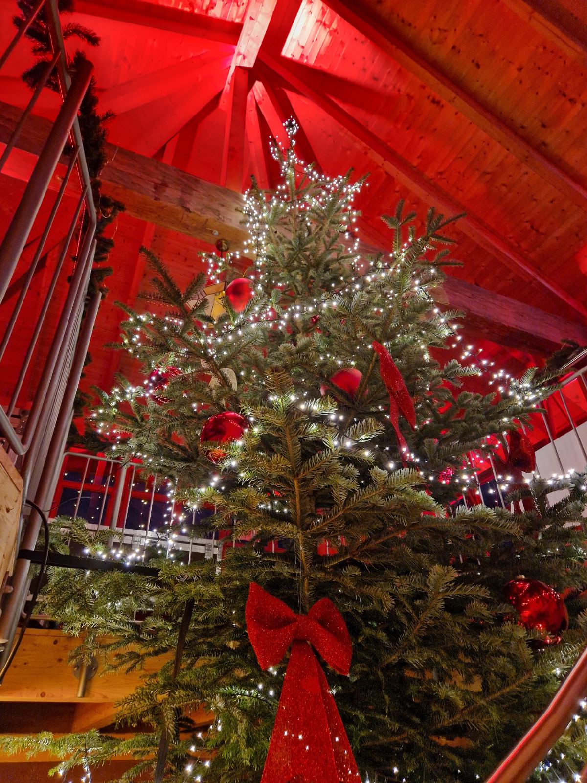 Decorated Christmas tree with a red bow